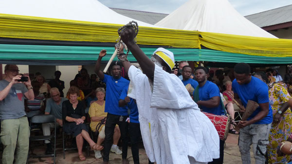 The dueling priests in the courtyard, with the photographer in the background. 