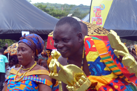 Community members in colorful clothing.