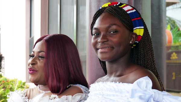 Beautiful mother and daughter after church one Sunday.