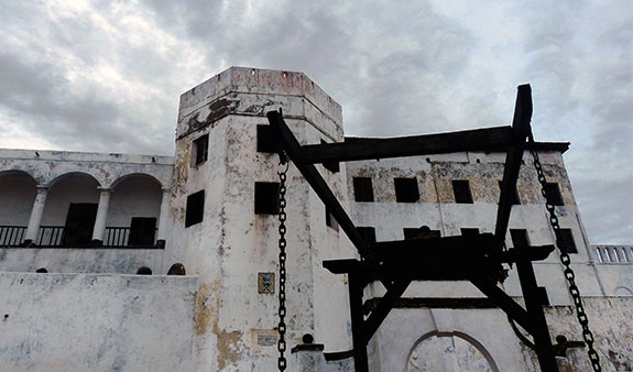 Grey skies and grey edifice of the Cape Coast Castle of the former Gold Coast, Africa.